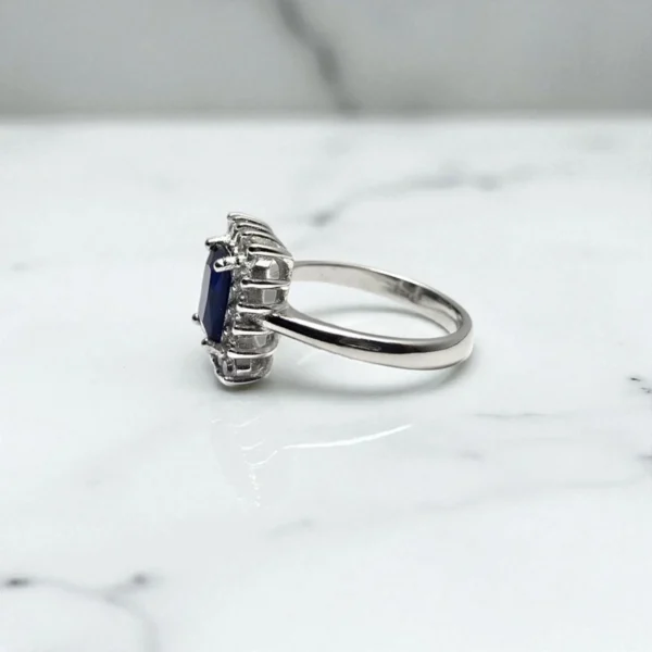 Side view of Regal Radiance Blue CZ Ring