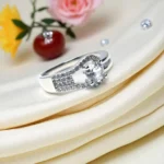 Main front view of 925 Halo Embrace CZ Ring