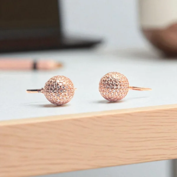 Side view of Blush Orbit Earrings