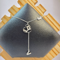 Close up of Crowned LOVE Necklace