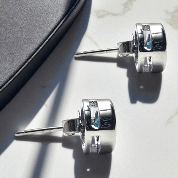 Side view of 925 Aqua Whisper Solitaire Studs