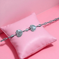 Close up of Mother-of-Pearl Heart Charm Bracelet