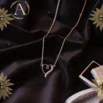Close up display of pendant and chain of Intertwined Heart Pendant Necklace – 925 Silver