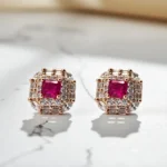 Close up front view with stone and finish display of Regal Ruby Prism Studs 925 Silver with Rose Gold Finish