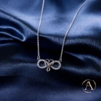Close up view of the pendant of Infinity and Intertwined Heart Necklace – 925 Silver