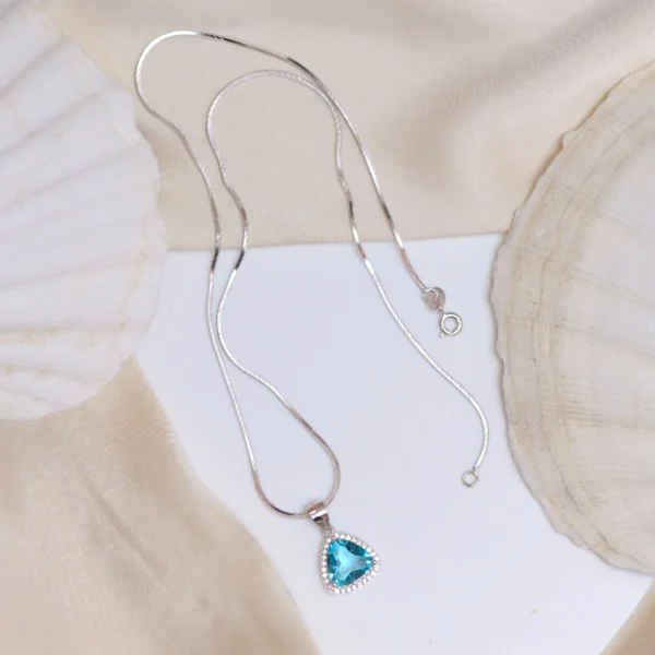 Full display of Trillion Cut Blue Topaz Halo Pendant Necklace