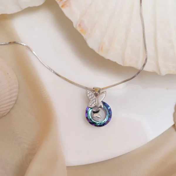 Top view of Ocean Aura Butterfly Pendant Necklace