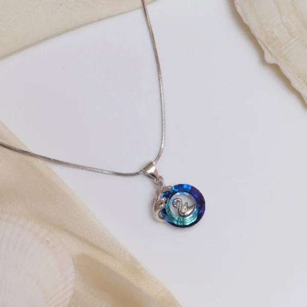 Side display of Blue Gradient Crystal Swan Pendant Necklace