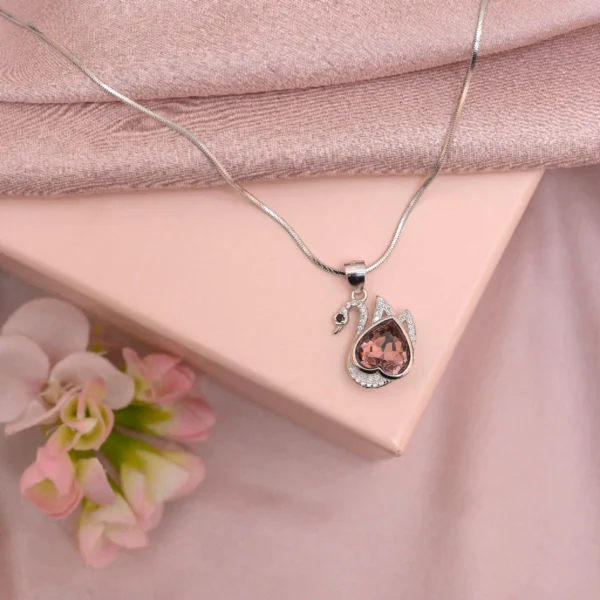 Display with chain of Blush Heart Swan Pendant Necklace