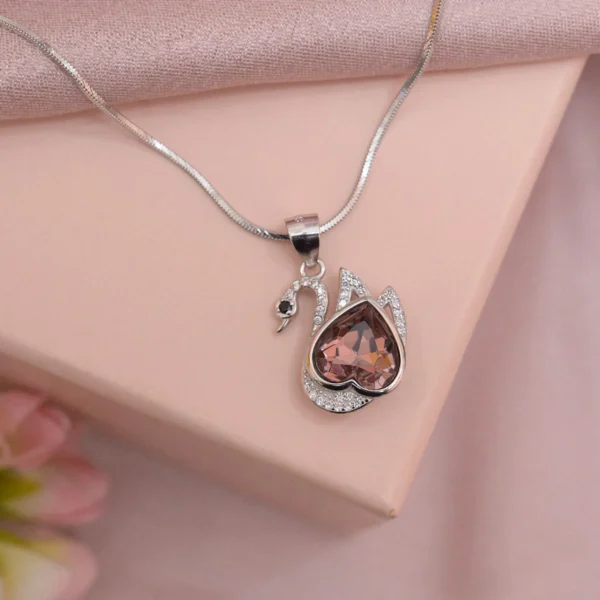 Top view of Blush Heart Swan Pendant Necklace