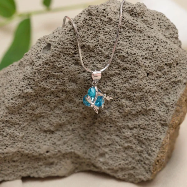Hanging display of Blue Heart Dragonfly Pendant Necklace