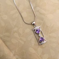 Close up of Hourglass of Love Pendant Necklace