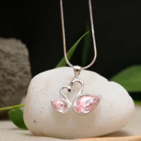 Locket display of Swan Love Pendant Necklace – 925 Silver with Pink Pear-Cut Gemstones