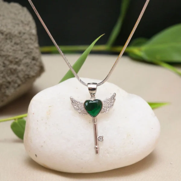 Full length display of Green Heart Winged Key Pendant Necklace
