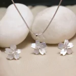 Hanging view of Blossom Petal Pendant with Earrings
