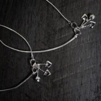 Close up of Heart Charm Anklets