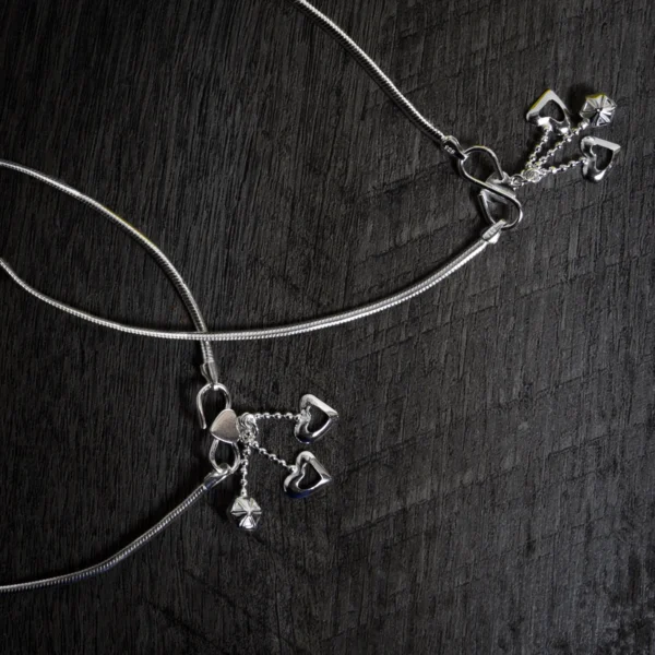 Close up of Heart Charm Anklets