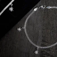 Close up of Lotus Charm Anklets