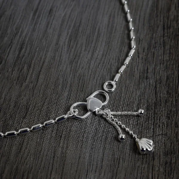 Charm display of Beaded Tassel Anklets