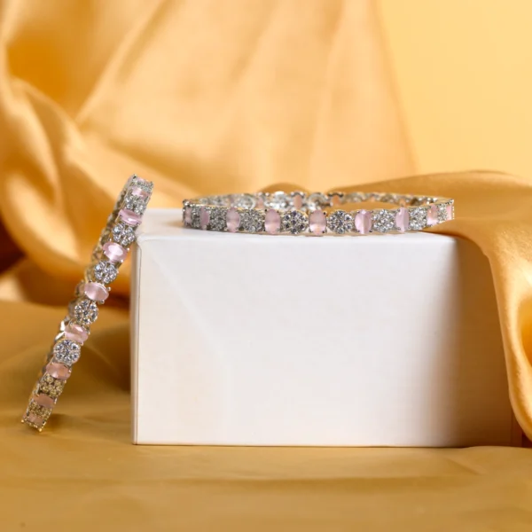 Stacked display of Pink Oval Stone CZ Designer Bangles in 925 silver