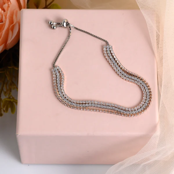 Spread across to display flexibility of Dual Tone 3-Layer CZ Tennis Bracelet