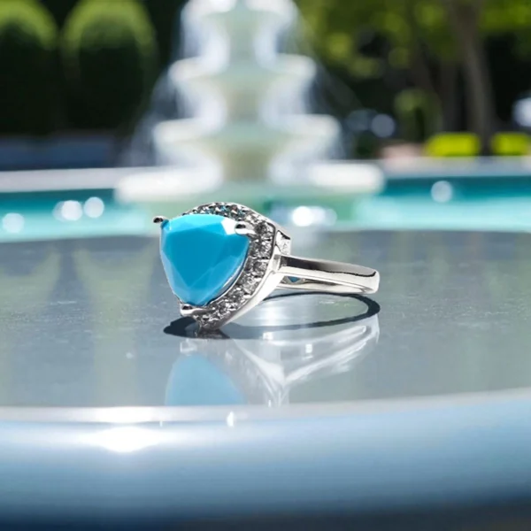 Side view of 925 Aqua Trilliant Spark Ring