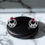 Close up of Ruby Orbit Studs