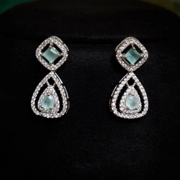 Earrings close up of Mint Cushion Drop Necklace Set