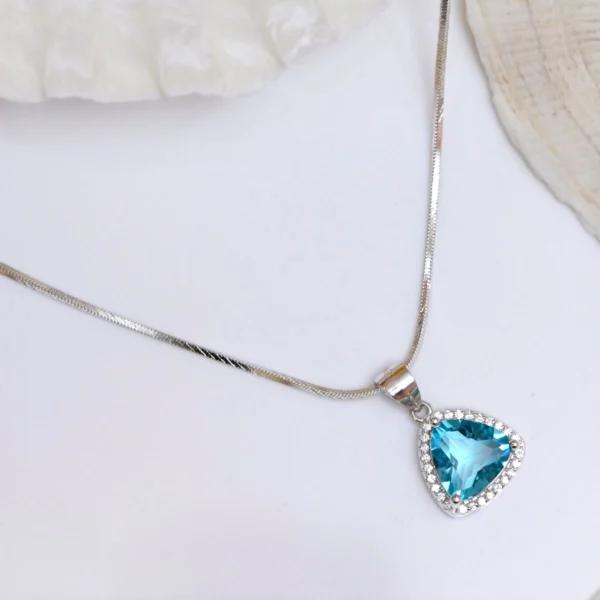 Top view of Trillion Cut Blue Topaz Halo Pendant Necklace