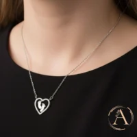 Model wearing close up view of Baby Feet in Heart Necklace – 925 Silver