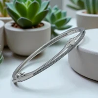 Tilted display of Silver Heart Kada Fine Row of Micro-Set CZ in 925 Silver