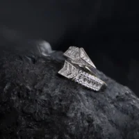 Tilted stylish display of Arrowline Ring – Sleek Baguette CZ Wrap in 925 Silver