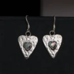 Close up of Abalone Heart Earrings 925 Silver