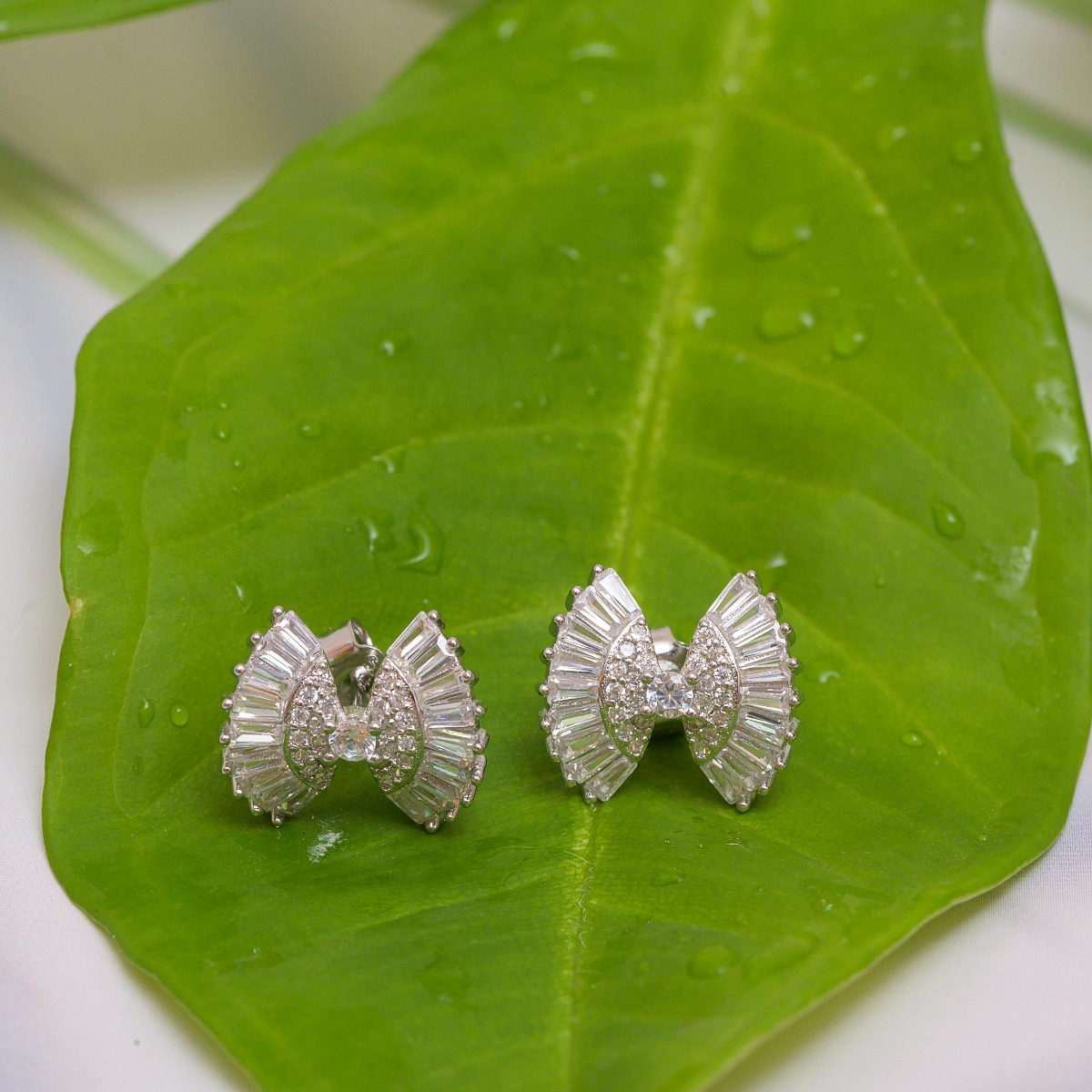 Baguette Bow-Tie Stud Earrings – 925 Silver 1 Close up of Baguette Bow-Tie Stud Earrings 925 Silver