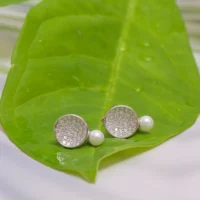 Close up of Disc Pearl Stud Earrings 925 Silver
