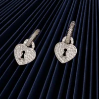 Close up of Heart and Keyhole Earrings 925 Silver