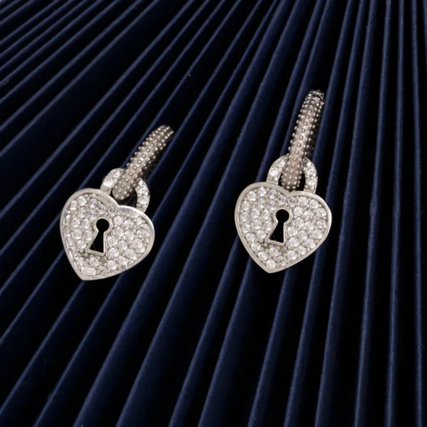 Close up of Heart and Keyhole Earrings 925 Silver