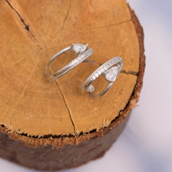 Close up of Pear Wrap Half Hoops 925 Silver