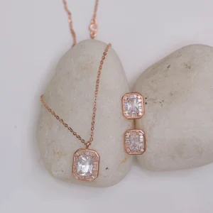 Close up of Rose Gold Emerald Cut Halo Set 925 Silver