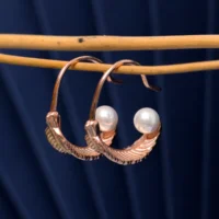 Close up of Rose Gold Feather Pearl Open Hoops 925 Silver
