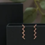 Close up of Rose Gold Zigzag Ear Climbers 925 Silver