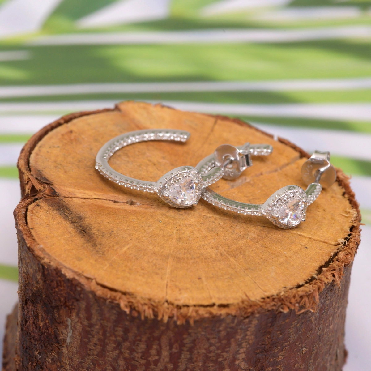 Pear Halo Half Hoops – 925 Silver 2 Display of Pear Halo Half Hoops 925 Silver