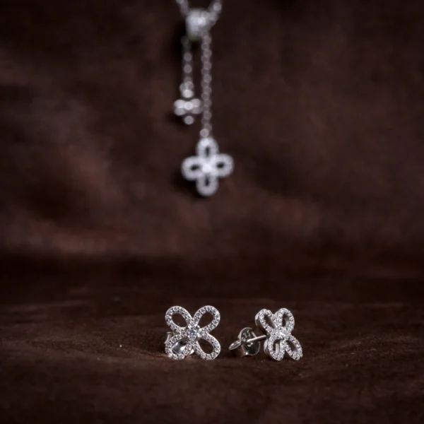Earrings with locking mechanism display of Pave Clover Lariat Set 925 Silver