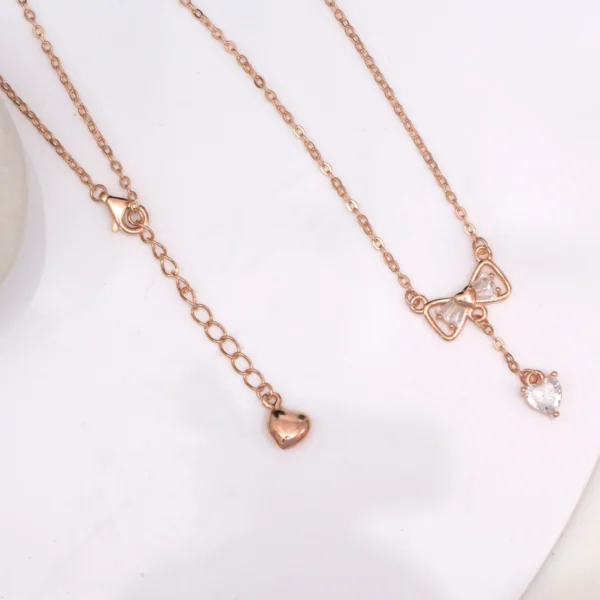 Pendant and chain lock close up display of Rose Gold Bow Lariat Set 925 Silver