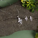 Pendant and earrings close up of Pave Tri-Petal Blossom Set 925 Silver