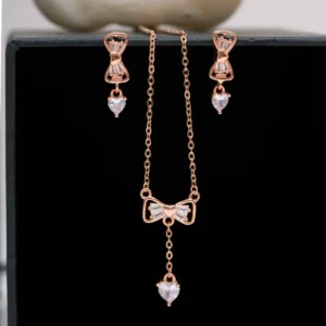 Pendant and earrings close up of Rose Gold Bow Lariat Set 925 Silver