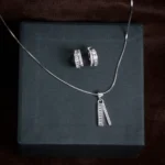 Pendant and earrings display of Baguette Bar Pendant and Huggie Set 925 Silver