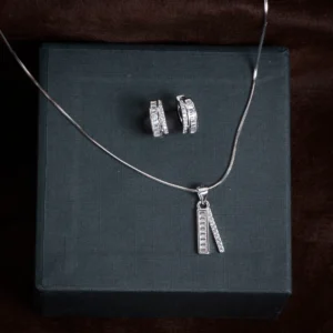 Pendant and earrings display of Baguette Bar Pendant and Huggie Set 925 Silver