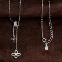 Pendant and locking mechanism close up of Pave Clover Lariat Set 925 Silver