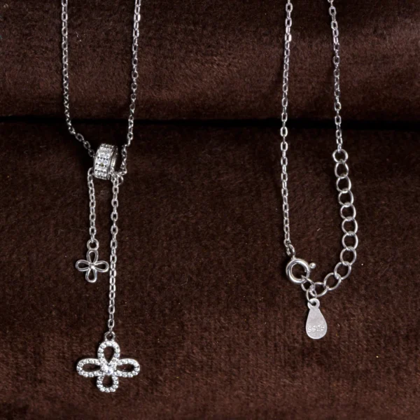 Pendant and locking mechanism close up of Pave Clover Lariat Set 925 Silver
